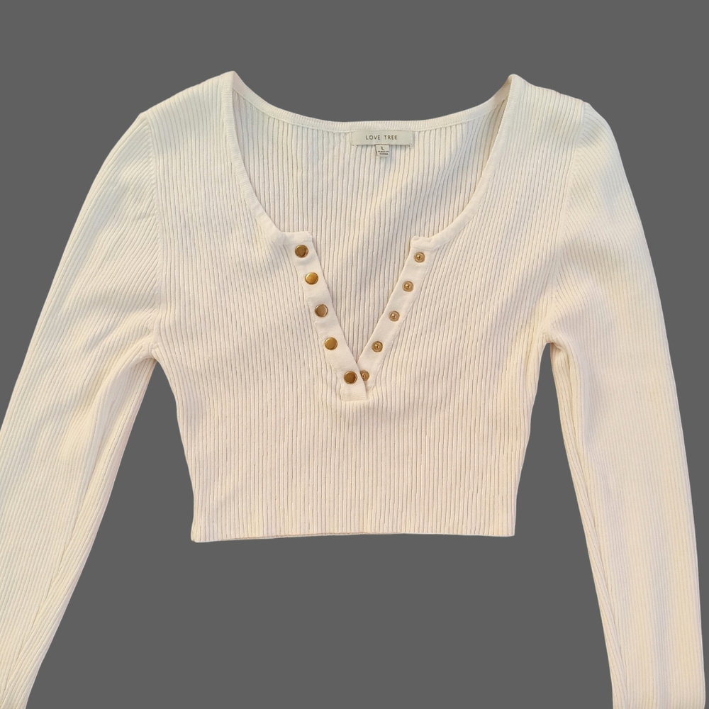 Trendy crop top sweater with button up. Sexy and cute